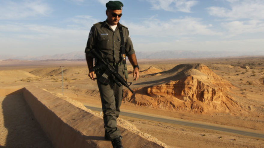 An Israeli Border Policeman patrols the area of the Judean Desert, near the Jordan border. Photo by Nati Shohat/Flash90.