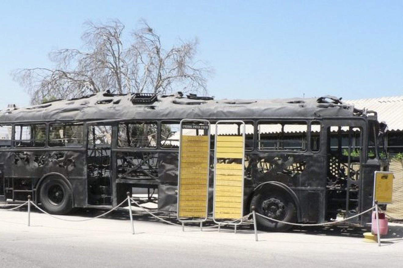 The remains of the Israeli bus hijacked by Palestinian terrorists in 1978 in an attack masterminded by female terrorist Dalal Mughrabi. Palestinian Media Watch learned that a Belgian-funded Palestinian school changed its name to the Dalal Mughrabi Elementary School. Credit: MathKnight via Wikimedia Commons.