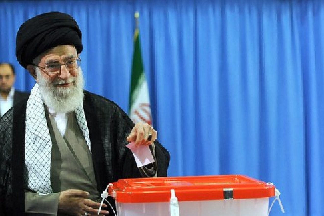 Supreme Leader Ayatollah Ali Khamenei casts his vote in Iran's 2013 presidential election. Credit: Mohammad Sadegh Heydari via Wikimedia Commons.