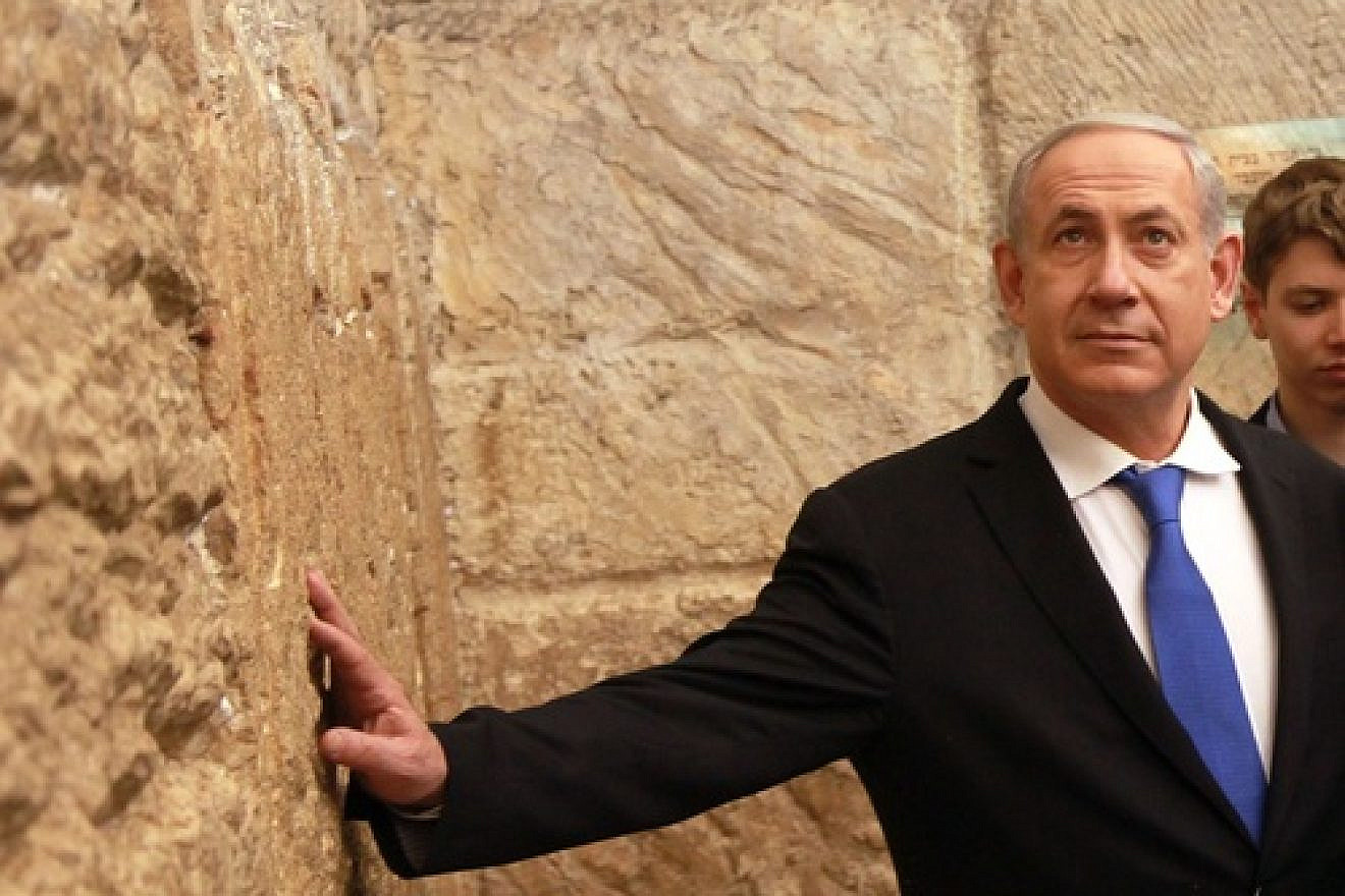 Click photo to download. Caption: Israeli Prime Minister Benjamin Netanyahu at the Western Wall on January 22, 2013. Credit: Marc Israel Sellem/POOL/Flash90.