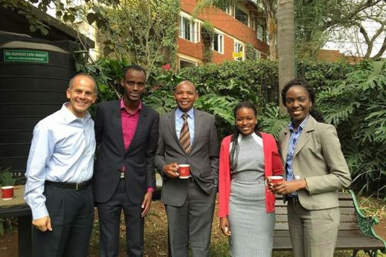 Jeremy Lustman (left) with East African lawyers. Credit: Eliana Rudee