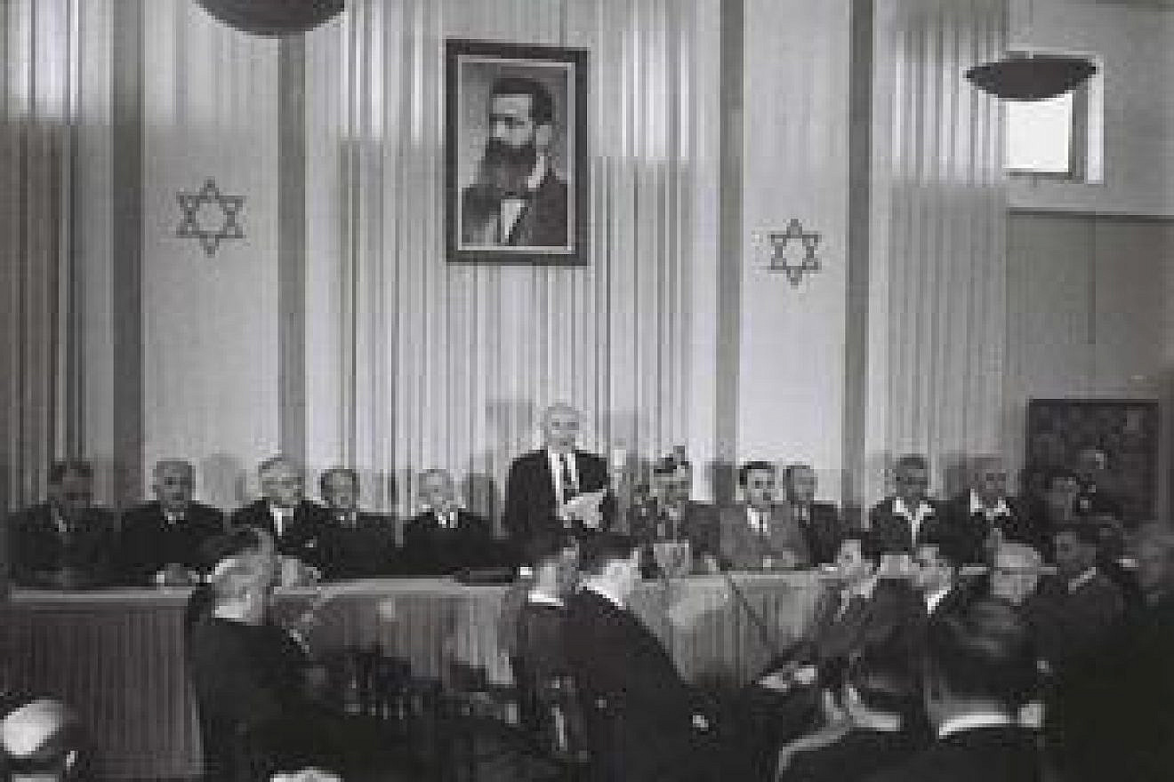 Israeli founding father and first prime minister David-Ben Gurion reading the declaration of the Independence of Israel in the Tel Aviv Museum, 1948. Credit: State of Israel National Photo Collection.
