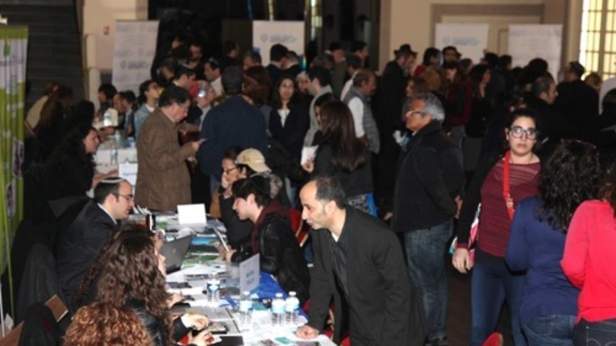 Click photo to download. Caption: An aliyah information fair in central Paris on March 30. Credit: Alain Azria.