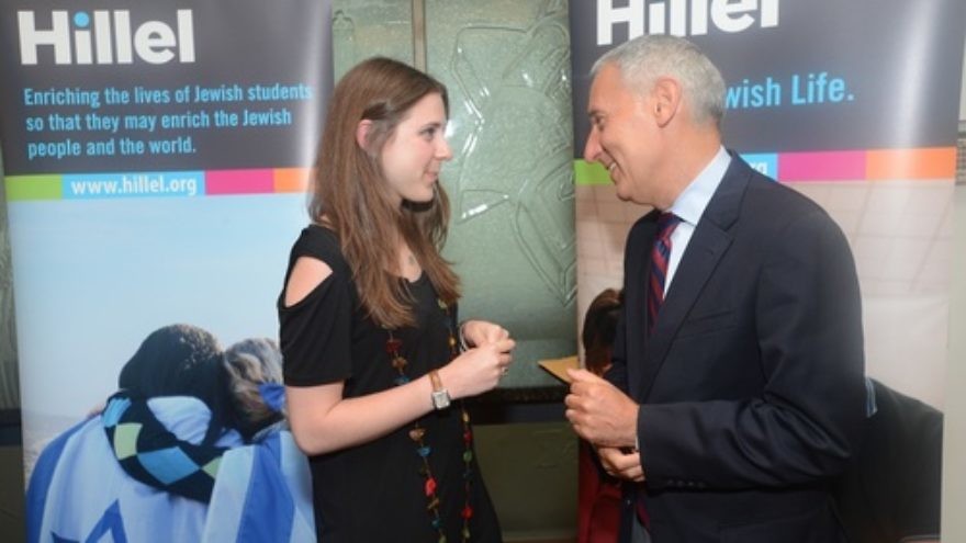 Eric Fingerhut, Hillel International's president and CEO, speaks with former student board member Johanna Rothseid. Credit: Shahar Azran for Hillel.