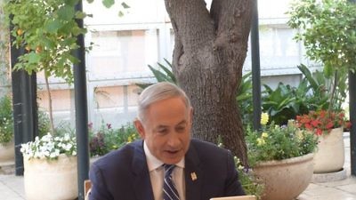 Israeli Prime Minister Benjamin Netanyahu answers questions on Twitter live at the prime minister’s residence in Jerusalem, May 12, 2016. Credit: Amos Ben Gershom/GPO.