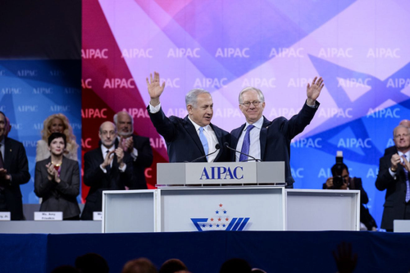 Israeli Prime Minister Benjamin Netanyahu (left) and former AIPAC President Michael Kassen wave to the crowd at the 2014 AIPAC conference in early March in Washington, DC. Netanyahu in his speech at AIPAC called on Palestinian Authority President Mahmoud Abbas to “recognize the Jewish state, and in doing so, you would be telling your people, the Palestinians, that while we might have a territorial dispute, the right of the Jewish people to a state of their own is beyond dispute.” Credit: AIPAC.