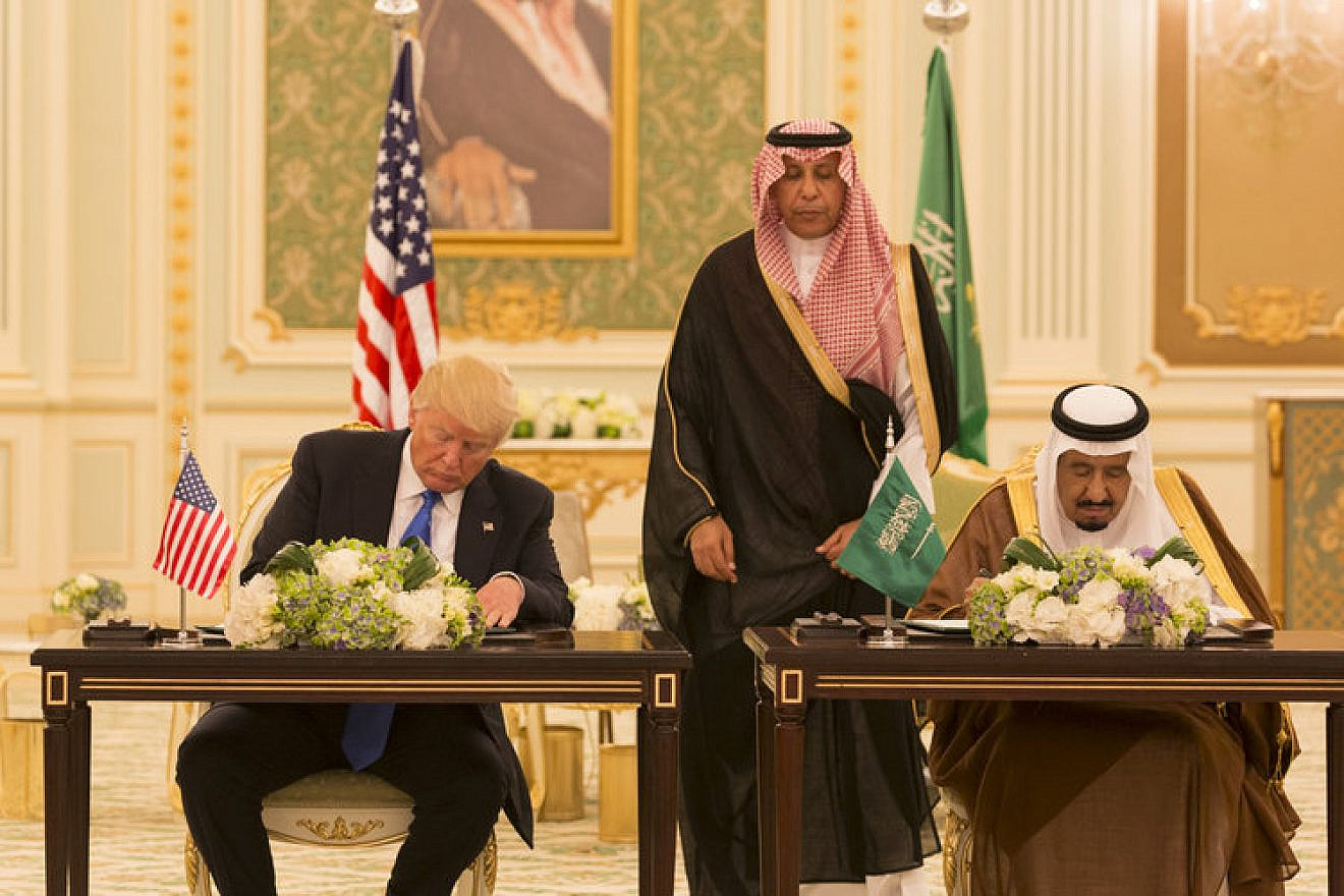 U.S. President Donald Trump and Saudi Arabia's King Salman sign a joint strategic vision statement in in Riyadh on May 20, 2017. Credit: Shealah Craighead/White House.