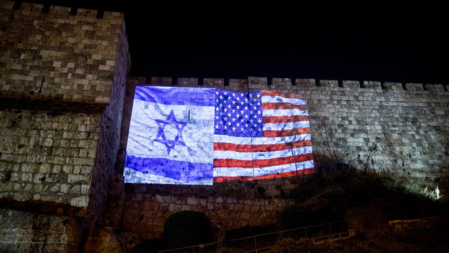 Images of Israeli and American flags projected onto the walls of the Old City of Jerusalem, following the recognition of Jerusalem as Israel's capital. Credit: Yonatan Sindel/Flash90.