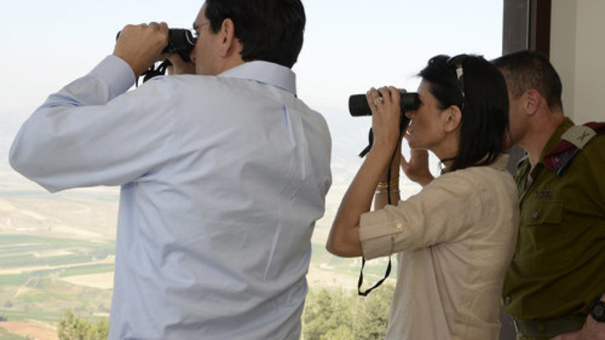 During a visit to northern Israel in June 2017, Israeli Ambassador to the United Nations Danny Danon (left) and U.S. Ambassador to the U.N. Nikki Haley (center) look out over southern Lebanon. Credit: Matty Stern/U.S. Embassy Tel Aviv/Flash90.