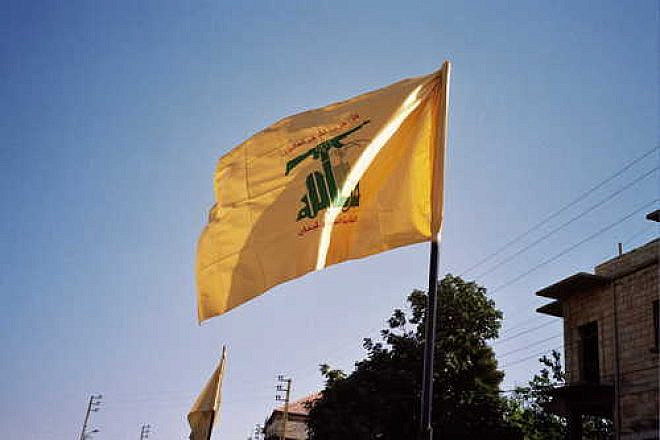 The flag of Hezbollah flies in Syria, where Hezbollah has become an active element in a civil war that has claimed the lives of 80,000 people. Credit: Hezbollah Flag/Wikimedia Commons.