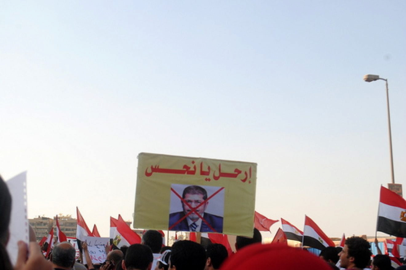Click photo to download. Caption: A protest against now former Islamist president Mohamed Morsi in Egypt on June 28, 2013. Credit: Lilian Wagdy via Wikimedia Commons.