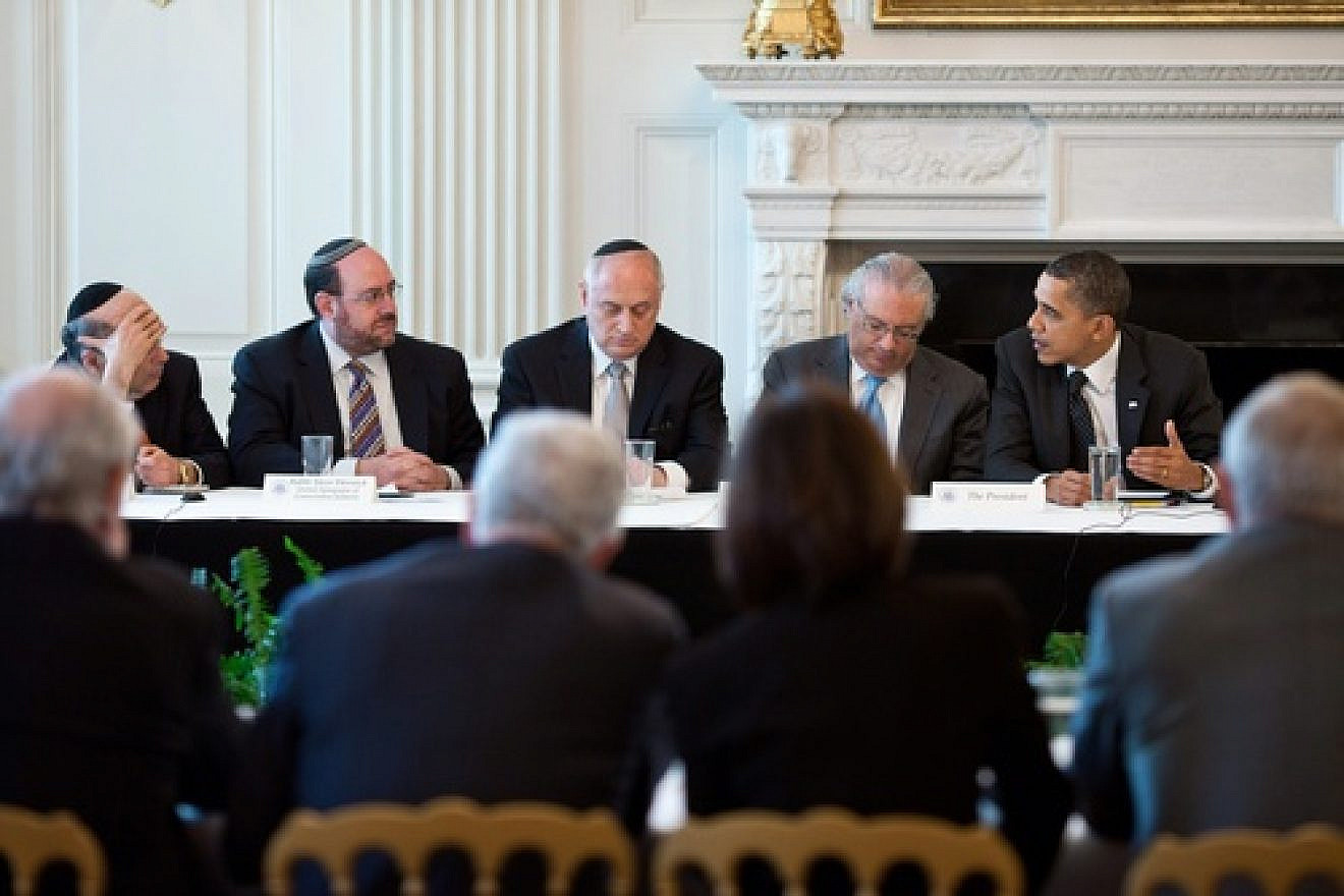 President Barack Obama meets with leaders from the Conference of Presidents of Major American Jewish Organizations in the State Dining Room of the White House on March 1, 2011. Far from being the war-crazed cabal that is depicted in the imaginations of conspiracy theorists, the “Israel Lobby” is in reality an oasis of calm reliability for a president who may just be on the cusp of his biggest foreign policy failure, in Syria, writes columnist Ben Cohen. Credit: White House Photo by Pete Souza.