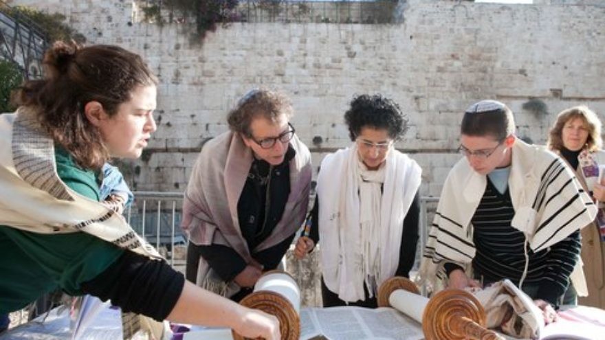 Click photo to download. Caption: Women of the Wall reading from the Torah at Robinson's Arch. Credit: Women of the Wall.