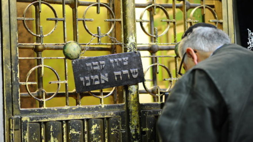 A Jewish man prays at the tomb of the biblical matriarch Sarah in Hebron’s Cave of the Patriarchs and Matriarchs on Nov. 25, 2016. Credit: Mendy Hechtman/Flash90.
