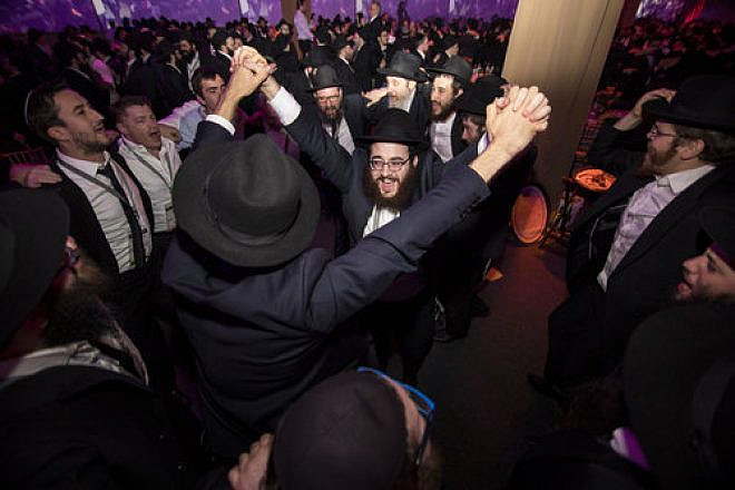 Emissaries and other guests rejoice during the Chabad-Lubavitch movement's 44th International Conference of Chabad-Lubavitch Emissaries (Kinus Hashluchim) in Bayonne, N.J., on Nov. 19, 2017. Credit: Chabad-Lubavitch/Chabad.org.