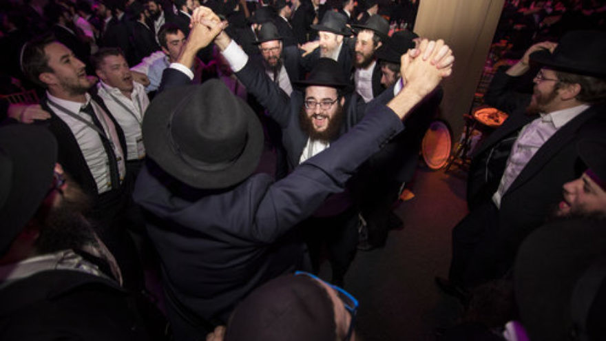Emissaries and other guests rejoice during the Chabad-Lubavitch movement's 44th International Conference of Chabad-Lubavitch Emissaries (Kinus Hashluchim) in Bayonne, N.J., on Nov. 19, 2017. Credit: Chabad-Lubavitch/Chabad.org.