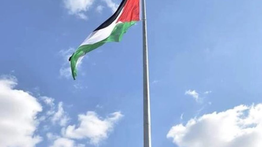 The Palestinian flag on a flagpole. (Illustrative.) Credit: Wikimedia Commons.