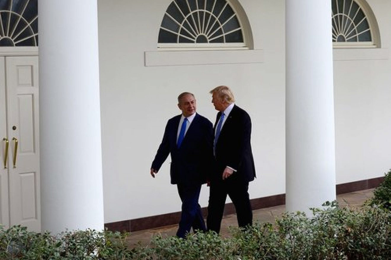 U.S. President Donald Trump and Israeli Prime Minister Benjamin Netanyahu walk along the White House colannade on Feb. 15, 2017. Credit: Avi Ohayon/GPO.