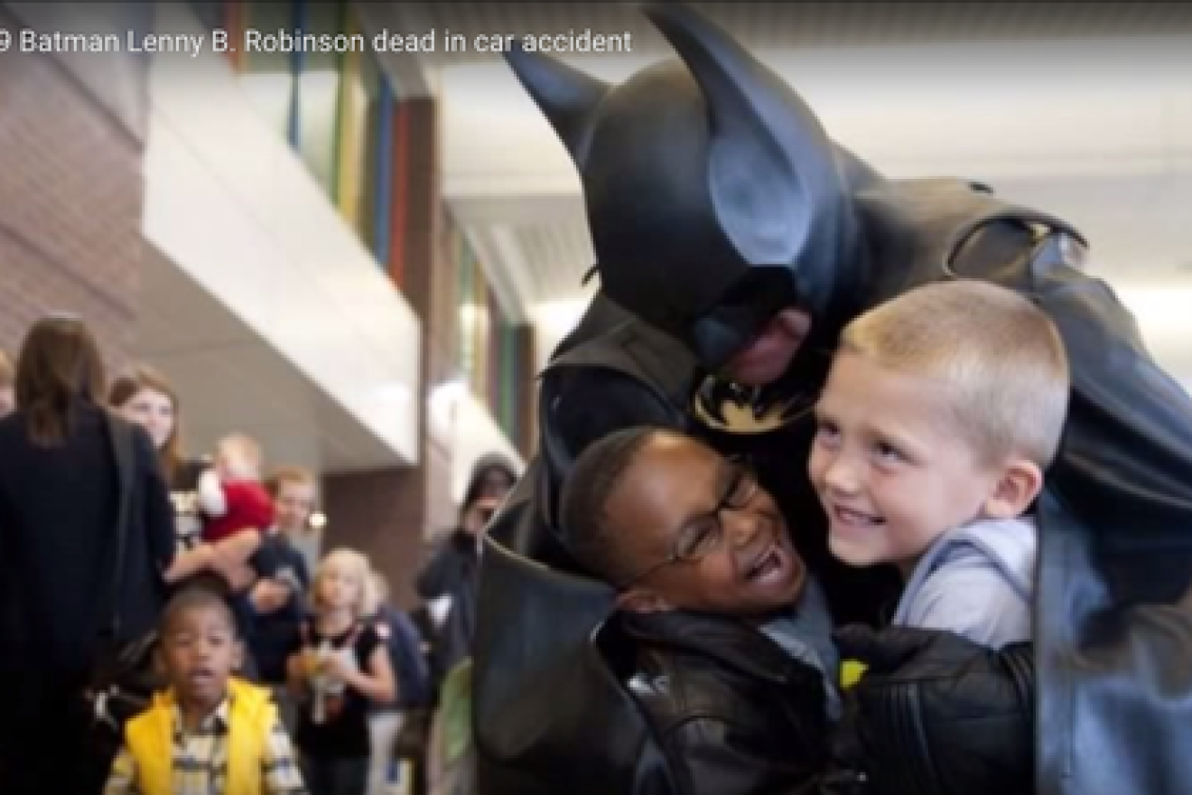Click photo to download. Caption: The late Leonard "Lenny" Robinson would dress in a Batman costume and visit pediatric wards in the Baltimore and Washington, DC areas. Credit: YouTube screenshot.