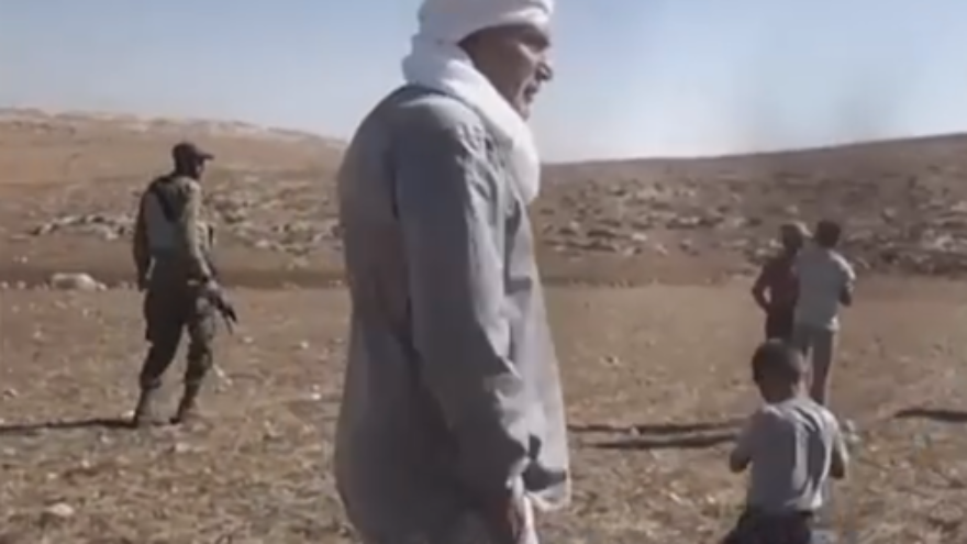 Footage of controversial pro-Palestinian activist Ezra Nawi, of the Israeli NGO Ta'ayush, that was aired on Israel's Channel 2. Credit: YouTube.