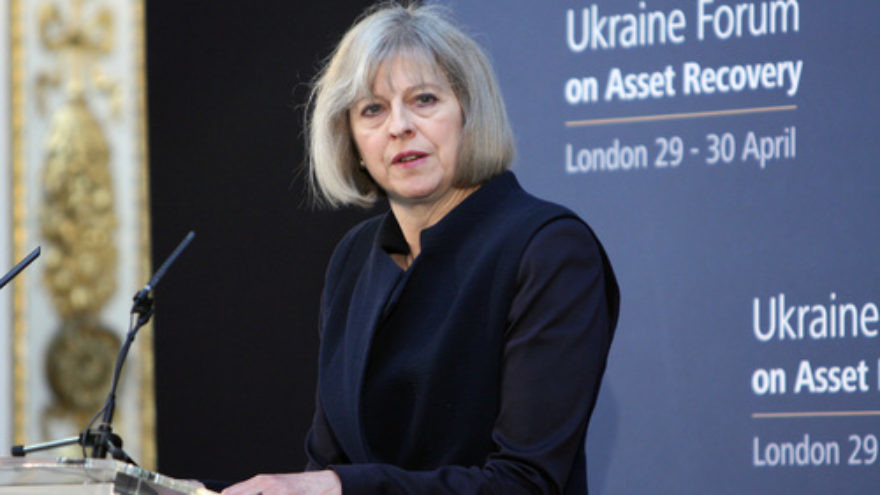 Former British Home Secretary Theresa May—who is now the U.K.'s prime minister—speaks at the Ukraine Forum on Asset Recovery in London on April 29, 2014. Credit: Foreign and Commonwealth Office via Wikimedia Commons.