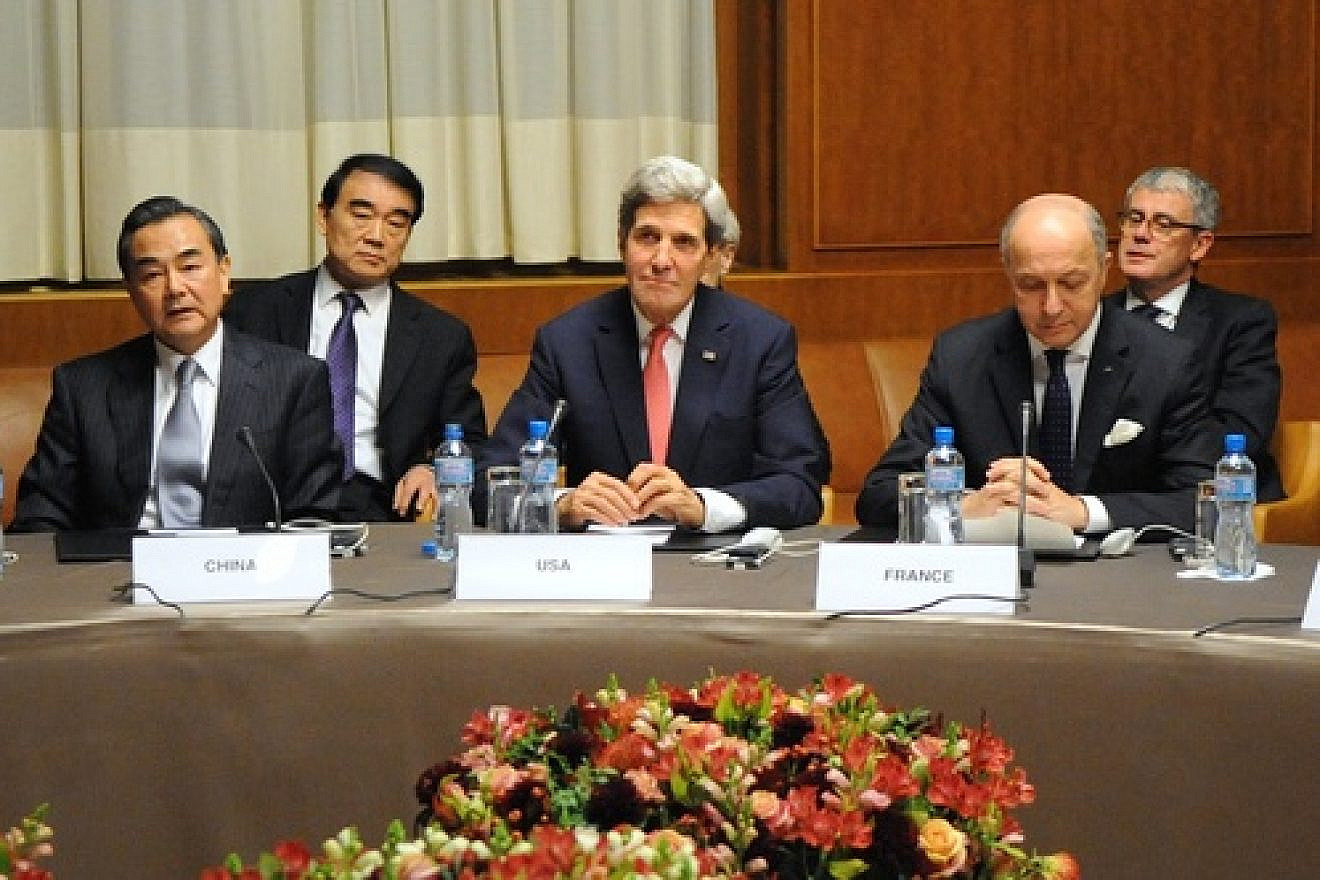 U.S. Secretary of State John Kerry (center), Chinese Foreign Minister Wang Yi and French Foreign Minister Laurent Fabius at U.N. headquarters after the P5+1 nations reached an interim nuclear deal with Iran in Geneva, Switzerland, on Nov. 24, 2013. Credit: U.S. State Department.