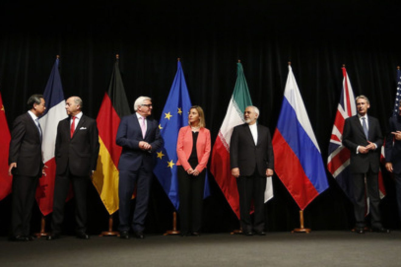 On July 14, 2015, foreign ministers and secretaries of state are pictured in Vienna, Austria, upon the announcement that Iran and the P5+1 nations had reached an agreement on Iran's nuclear program. From left to right: Wang Yi (China), Laurent Fabius (France), Frank-Walter Steinmeier (Germany), Federica Mogherini (European Union), Mohammad Javad Zarif (Iran), Philip Hammond (United Kingdom), and John Kerry (United States). Credit: Bundesministerium für Europa, Integration und Äusseres via Wikimedia Commons.