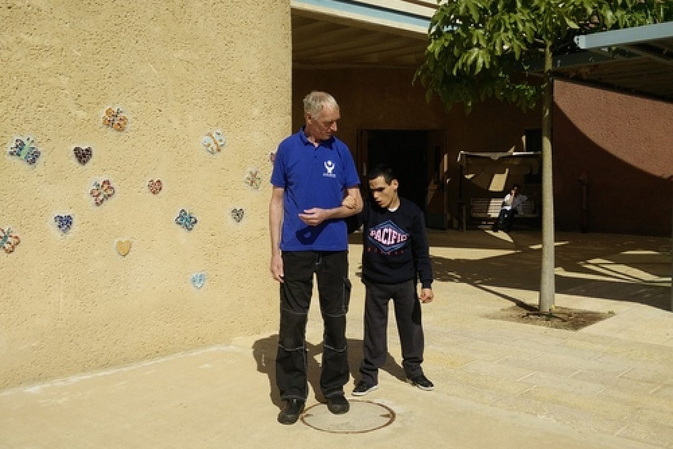 Peter Von Brockhausen (left) and Elad Sair at the Aleh Negev-Nahalat Eran rehabilitation village in southern Israel. Credit: Courtesy Jewish National Fund.