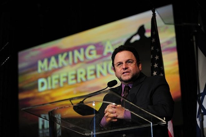 Click photo to download. Caption: Former Seinfeld star Jason Alexander speaks at the Dec. 6 Friends of the Israel Defense Forces gala in Los Angeles, for which he was the emcee. Credit: Alexi Rosenfeld.