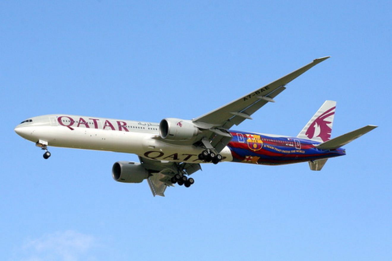 A Qatar Airways plane that in its back half bears the logo of Spain’s FC Barcelona soccer team, indicative of the close relationship between European soccer clubs and Qatari coffers. Credit: John Taggart via Wikimedia Commons.
