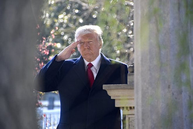 President Donald Trump gives a salute at the gravesite of former President Andrew Jackson. Credit: Tennessee National Guard Public Affairs Office via Wikimedia Commons.