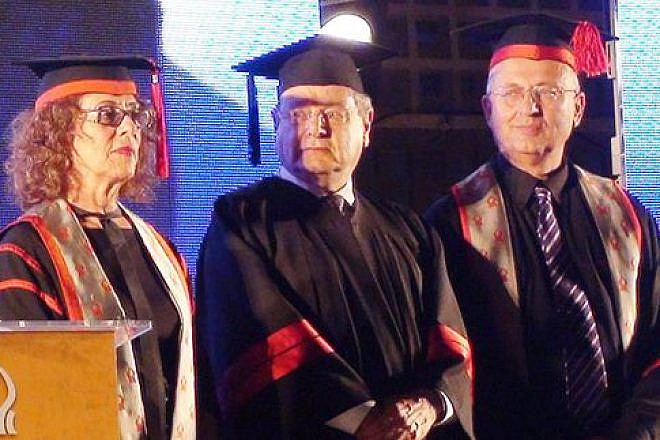 Click photo to download. Caption: Sir Martin Gilbert (center) is awarded an honorary doctorate at Ben Guion University in Be'er Sheva, Israel, in May 2011. Credit: Wikimedia Commons.