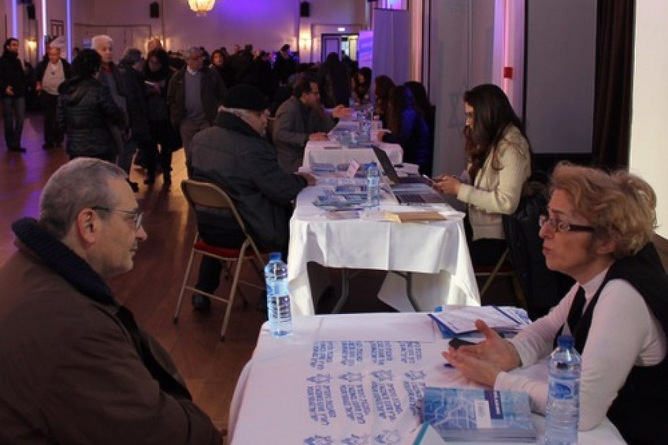 An aliyah information fair hosted by The Jewish Agency for Israel on Jan. 11 in Paris, days after a series of terror attacks in that city. The fair was planned before the attacks took place. Credit: Eliaou Zenou for The Jewish Agency for Israel.