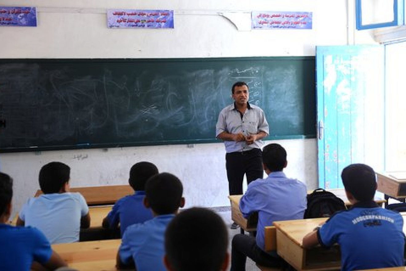 A teacher leads a class at an UNRWA school in the Gaza Strip, September 2011. Credit: Shareef Sarhan/U.N. Photo.