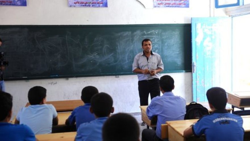 In September 2011, a teacher leads one of the first classes of the new academic year at a Gaza-based U.N. Relief and Works Agency for Palestine Refugees in the Near East (UNRWA). Credit: U.N. Photo/Shareef Sarhan.
