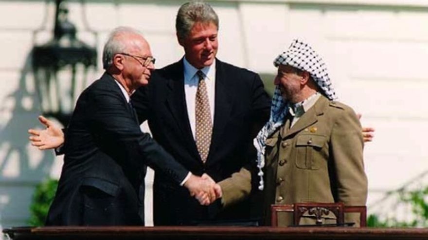 From left: Israeli Prime Minister Yitzhak Rabin, U.S. President Bill Clinton and Palestine Liberation Organization head Yasser Arafat at the signing of the Oslo Accords on Sept. 13, 1993. Credit: Vince Musi/The White House.