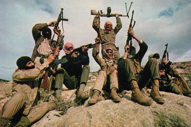 In 1969, members of the Popular Front for the Liberation of Palestine (PFLP) terror group are pictured flaunting their weapons in the mountains east of the Jordan River. Eclipsed in recent decades by the other Palestinian factions of Fatah and Hamas, the PFLP returned to the scene with a vengeance on Nov. 18, 2014, at a synagogue in the Har Nof section of Jerusalem. Four male worshippers and a Druze police officer were killed in the especially bloody terror attack. Credit: Thomas R. Koeniges via Wikimedia Commons.