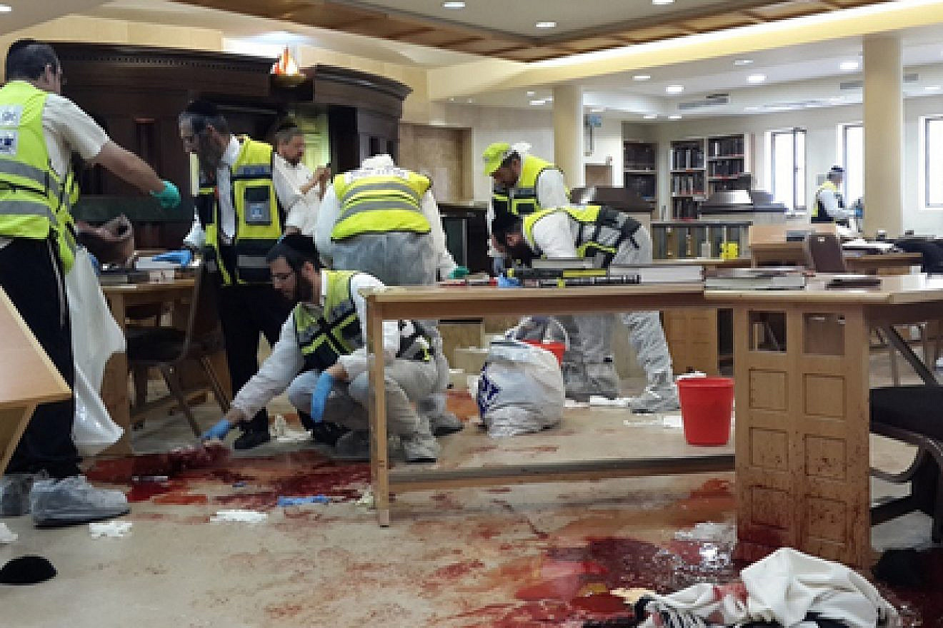 Israeli ZAKA first responders at the site on Nov. 18, 2014, where two Palestinian terrorists entered the Kehilat Yaakov synagogue in the Jewish neighborhood of Har Nof, Jerusalem, with pistols and axes, and began attacking worshippers. Five rabbis and a Druze police officer were murdered. Credit: ZAKA. Spokesperson.