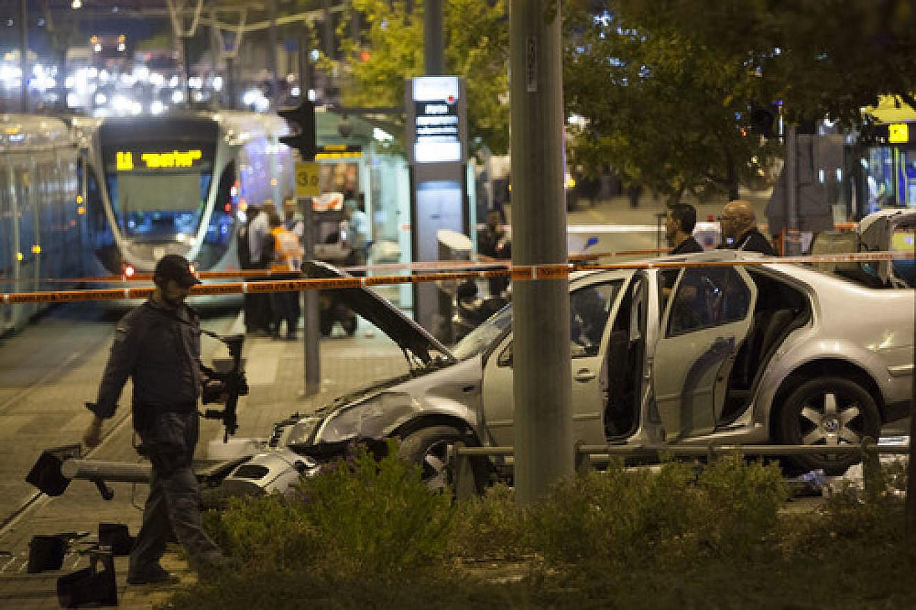 The scene of a car crashing into Jerusalem's Ammunition Hill light-rail station in a Palestinian terrorist attack on Oct. 22, 2014. Photo by Flash90.