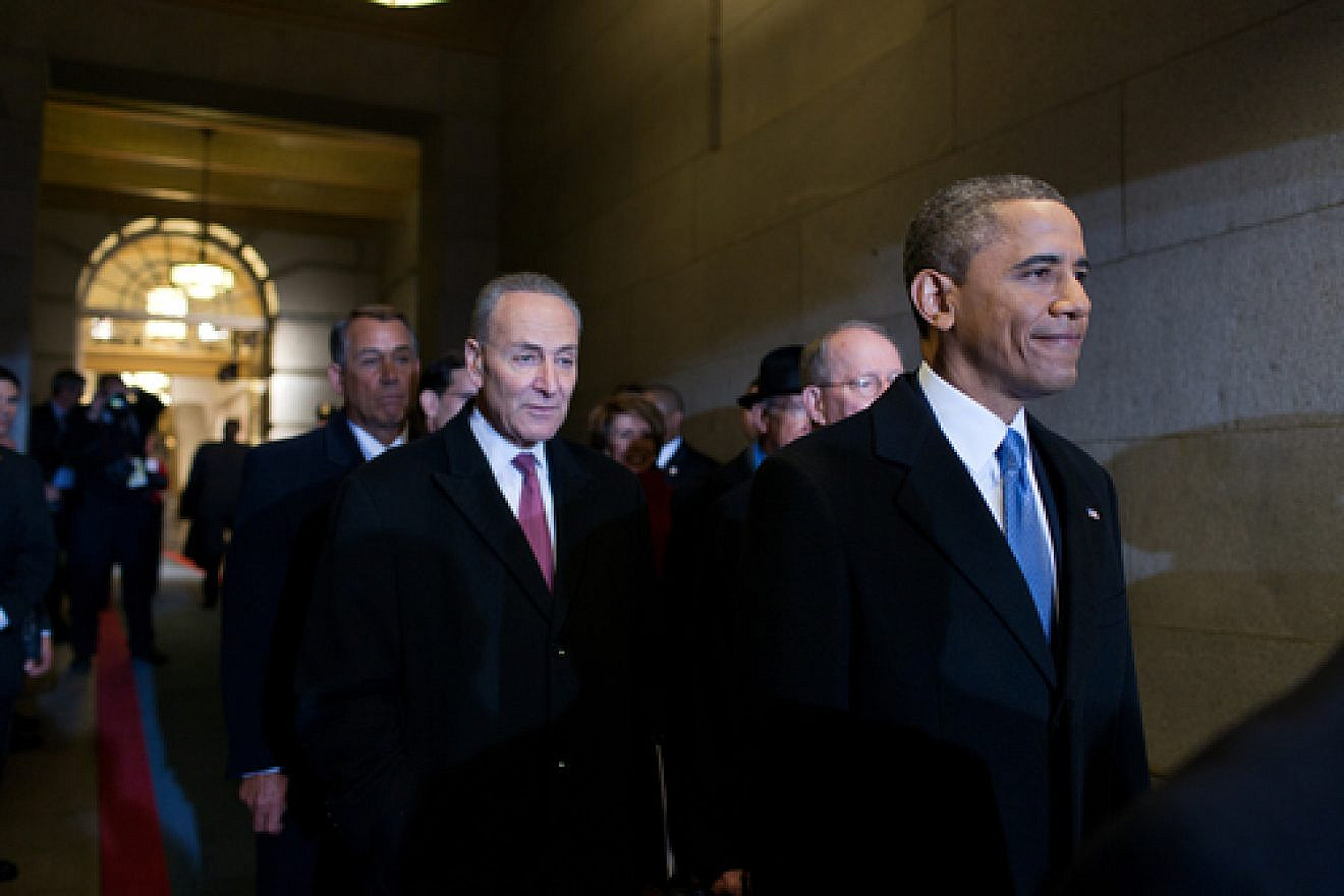 U.S. Sen. Chuck Schumer (D-N.Y., pictured in center) supports a bill that would mandate Congressional review of a final nuclear deal with Iran. President Barack Obama (far right), after previously vowing to veto the bill, may now approve a modified version. Credit: Pete Souza/White House.