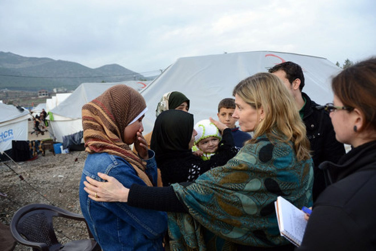 Nancy Lindborg, USAID's assistant administrator for democracy, conflict and humanitarian assistance, interacts with Syrian refugees at the Islahiye Refugee Camp in Turkey on Jan. 24, 2013. Credit: U.S. State Department.