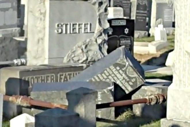 Overturned headstones at Washington Cemetery, a Jewish cemetery in Brooklyn, N.Y., in December 2010. Credit: YouTube.