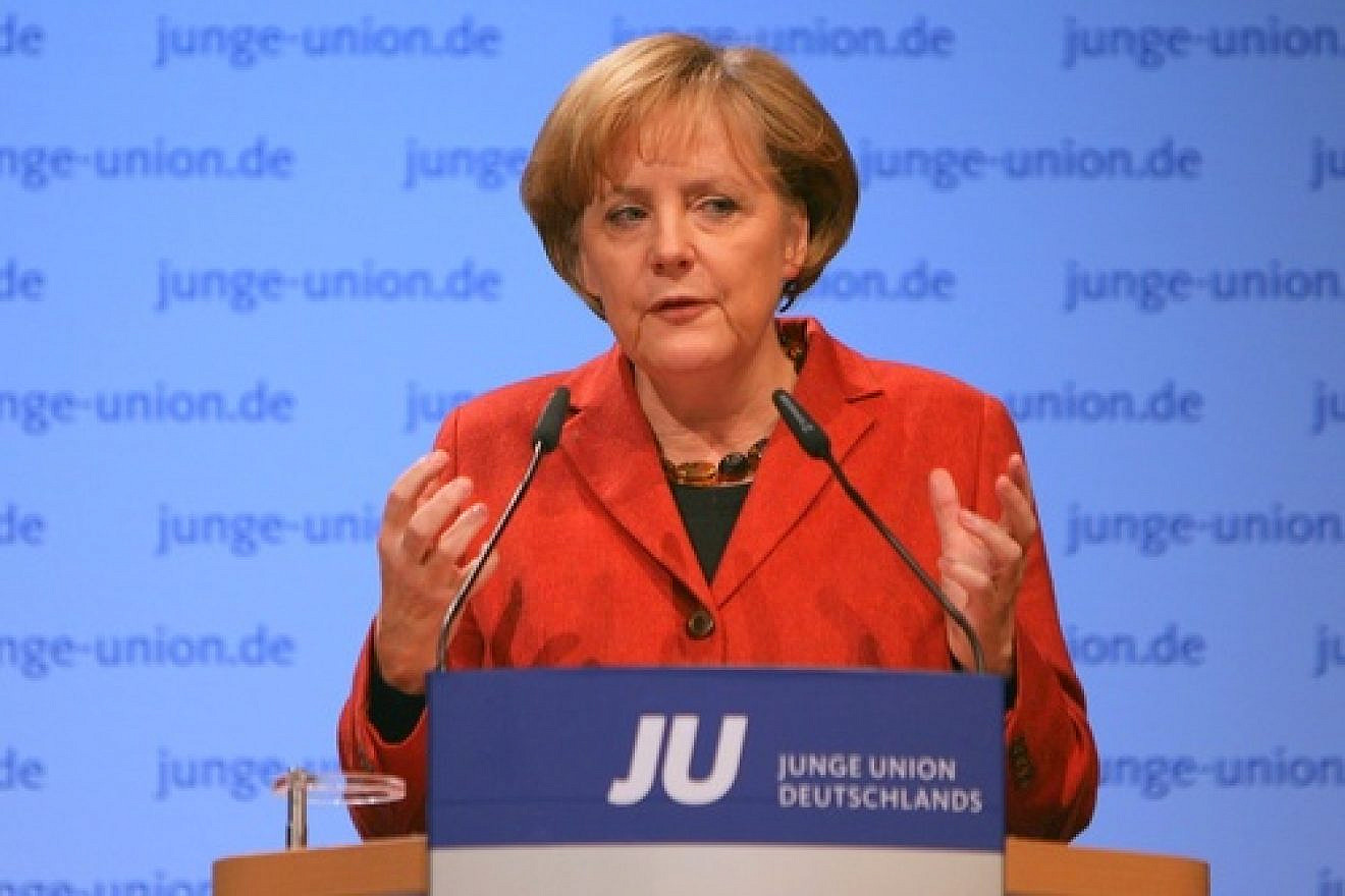 While German Chancellor Angela Merkel (pictured) has vowed that the German parliament will pass legislation legalizing circumcision in the fall, negotiations over the language of such a bill have revealed that many in the Bundestag may push for restrictions on the practice such as forcing the use of anesthetics or requiring a doctor to be present. Credit: Jacques Grießmayer.