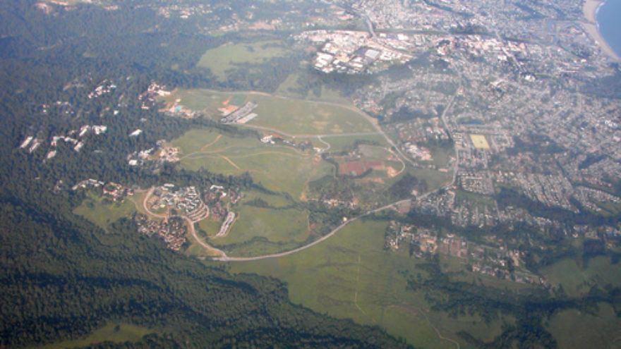 Click photo to download. Caption: An aerial view of the UC Santa Cruz campus and others areas in Santa Cruz, Calif. Credit: Doc Searls via Wikimedia Commons.