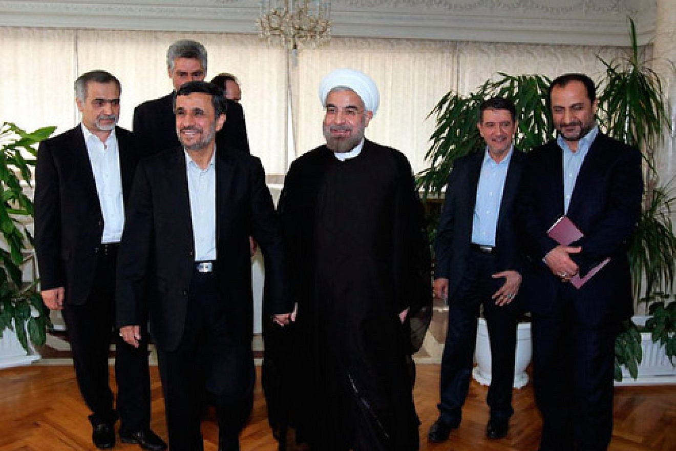 Iranian President Hassan Rouhani (center) with his predecessor, Mahmoud Ahmadinejad (second from left), in June 2013. Credit: Wikimedia Commons.