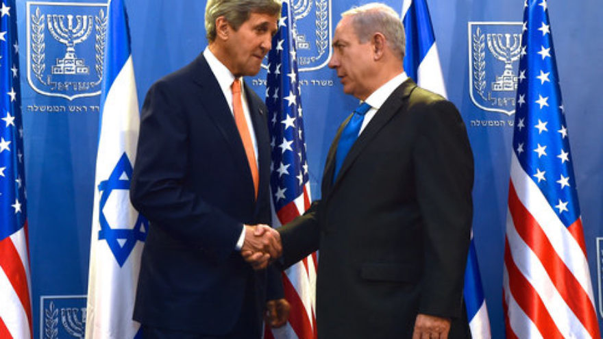 Former U.S. Secretary of State John Kerry shakes hands with Israeli Prime Minister Benjamin Netanyahu in Tel Aviv in July 2014. Citing unidentified former senior Obama administration officials, the Haaretz newspaper reported Sunday that Netanyahu had met with Egyptian and Jordanian heads of state in a secret meeting last year in Jordan, in order to promote a regional peace agreement. Credit: U.S. Department of State.