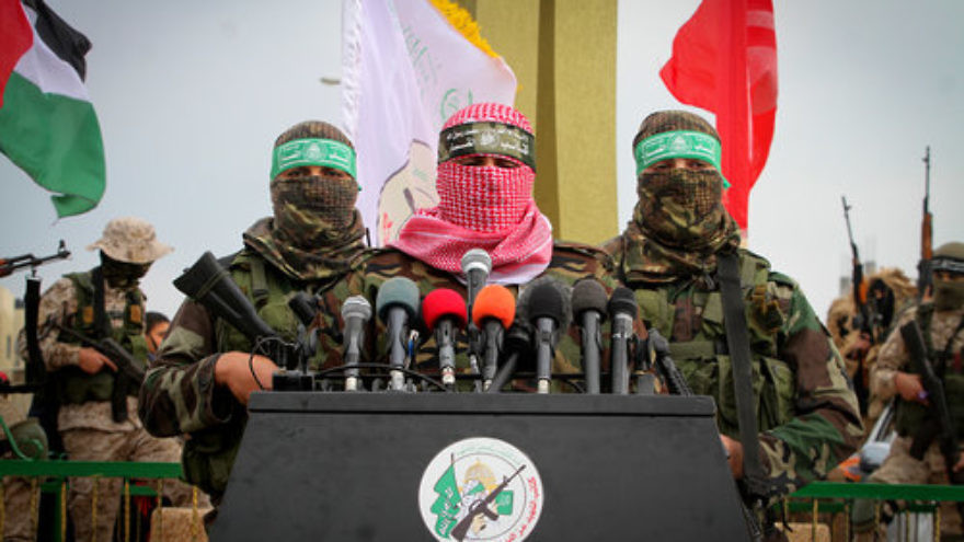 Abu Ubaida (center), a spokesman for Hamas’s military wing, speaks in the southern Gaza town of Rafah on Jan. 31, 2017. Credit: Abed Rahim Khatib/Flash90.