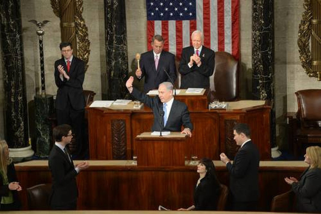 Israeli Prime Minister Benjamin Netanyahu waves to the crowd during his address to a joint session of Congress, March 3, 2015. Credit: Amos Ben Gershom/GPO.