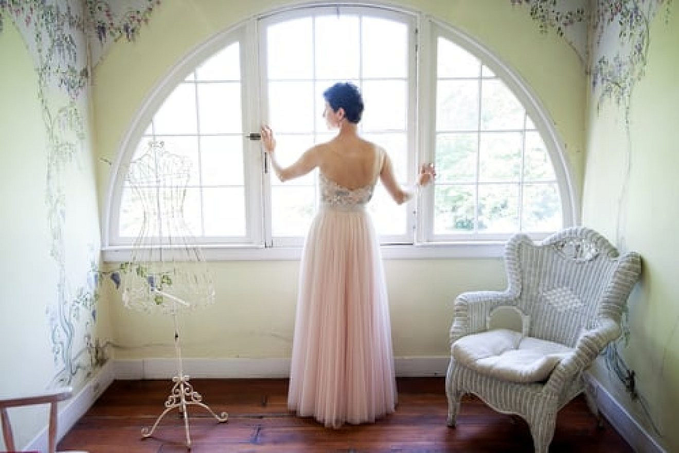 Melinda Michel of Baltimore is pictured in the dress she wore to her second wedding. Credit: Richard and Tara Photography.