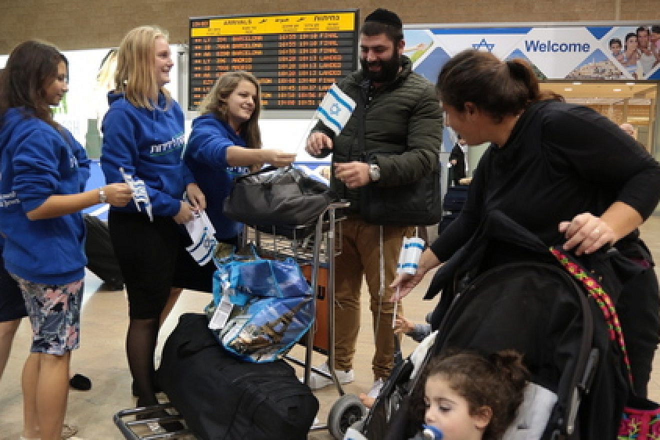 On Nov. 16, days after the Paris attacks, the Ventura Family arrives at Ben-Gurion Airport in Israel after moving out of France with the help of the International Fellowship of Christians and Jews. French Jewish aliyah has been on the rise and is now expected to experience a further uptick after the Paris attacks. Credit: Daniel Bar-On.